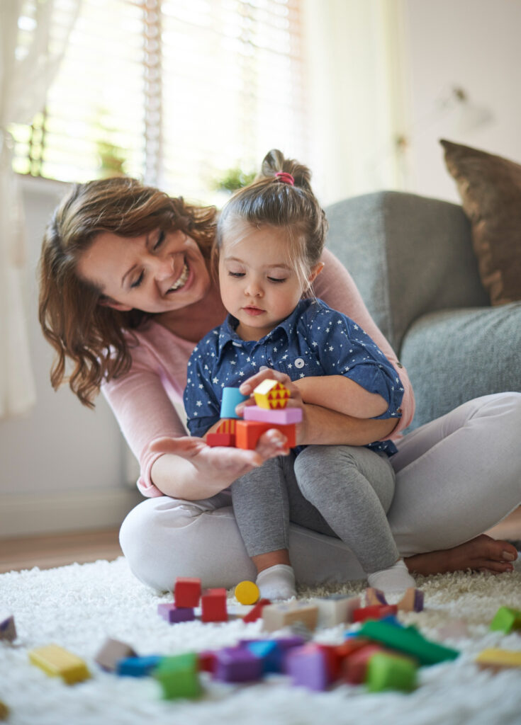 mother-daughter-playing-with-toys